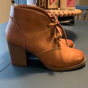 Laced booties with stacked heel